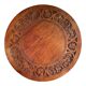 Circular tripod coffee table in carved wood