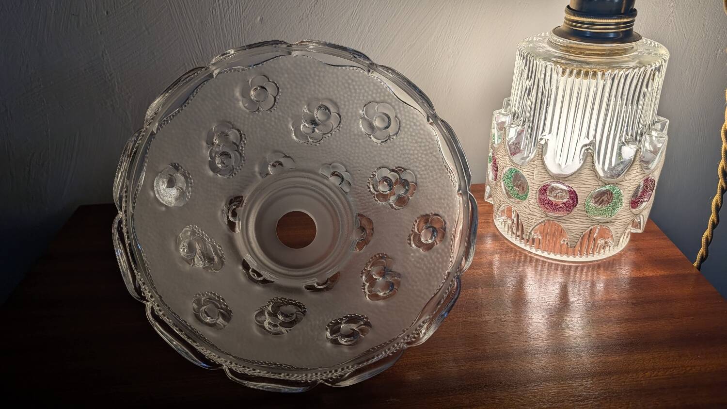 Moulded glass lampshade with floral decoration, granite texture.
