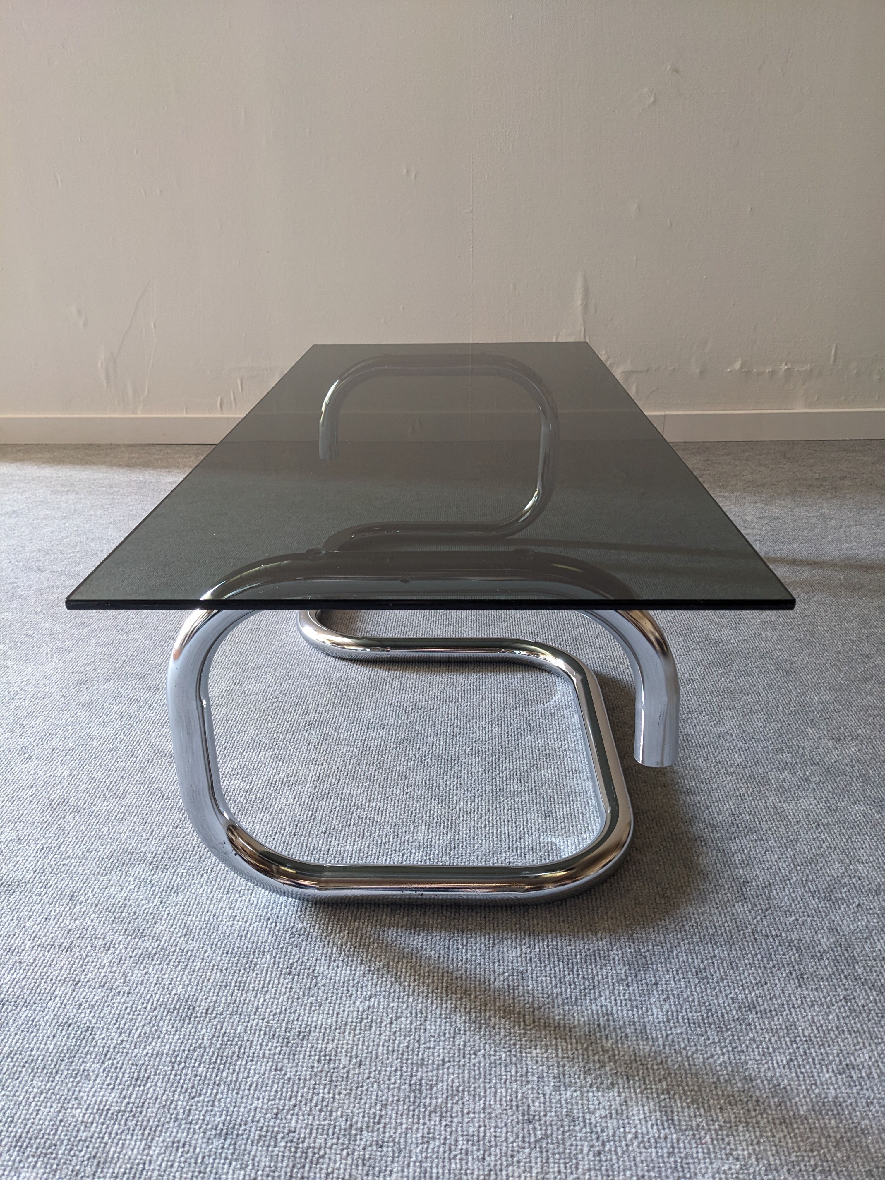 Space age coffee table in smoked glass from the 60s/70s