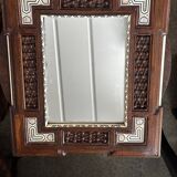 Oriental mirror in carved and turned wood inlaid with mother-of-pearl H 44/L 38 cm