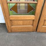 Series of three doors with stained glass windows