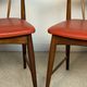 Pair of Scandinavian armchairs in teak and red faux leather – 1960s