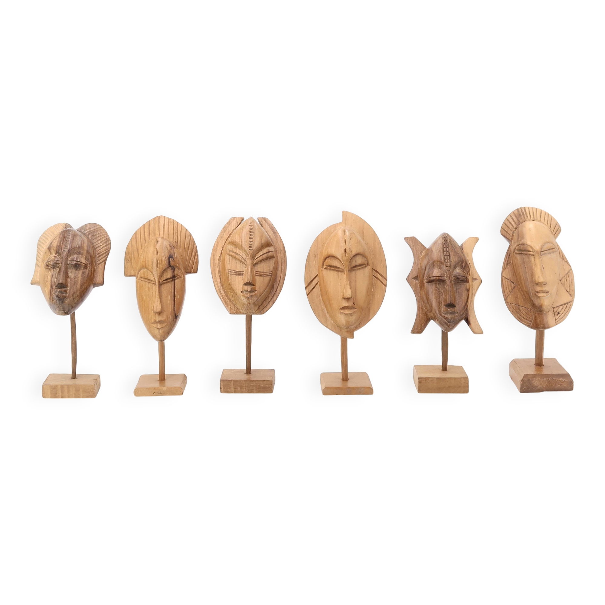 Six African masks with wooden bases, 1970s