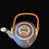 Porcelain teapot with Japanese decor