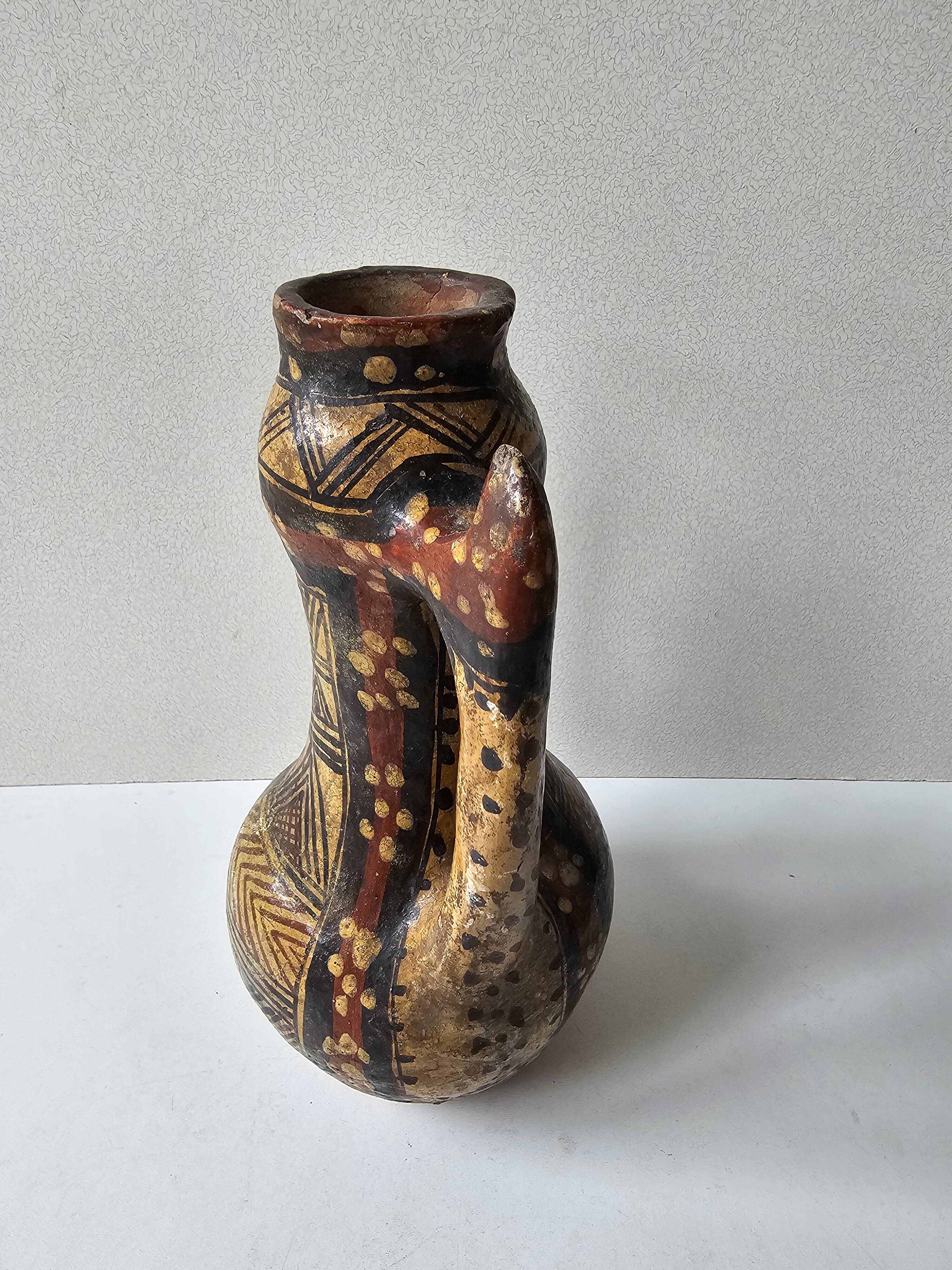 Kabyle Algerian pottery oil jar with polychrome geometric decorations