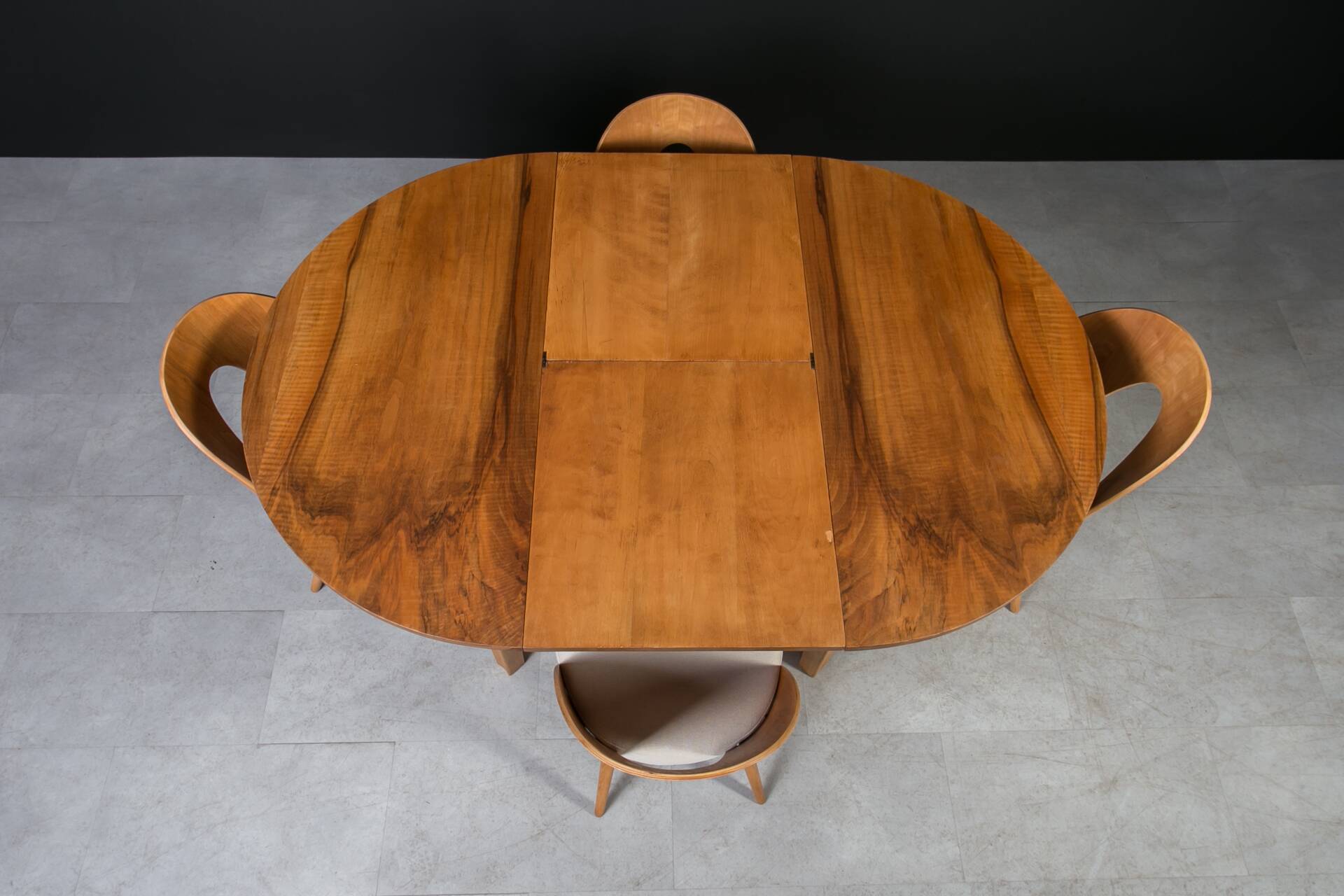 Unique dining set: Extendable round table and Czech chairs by Antonín Šuman