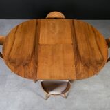 Unique dining set: Extendable round table and Czech chairs by Antonín Šuman