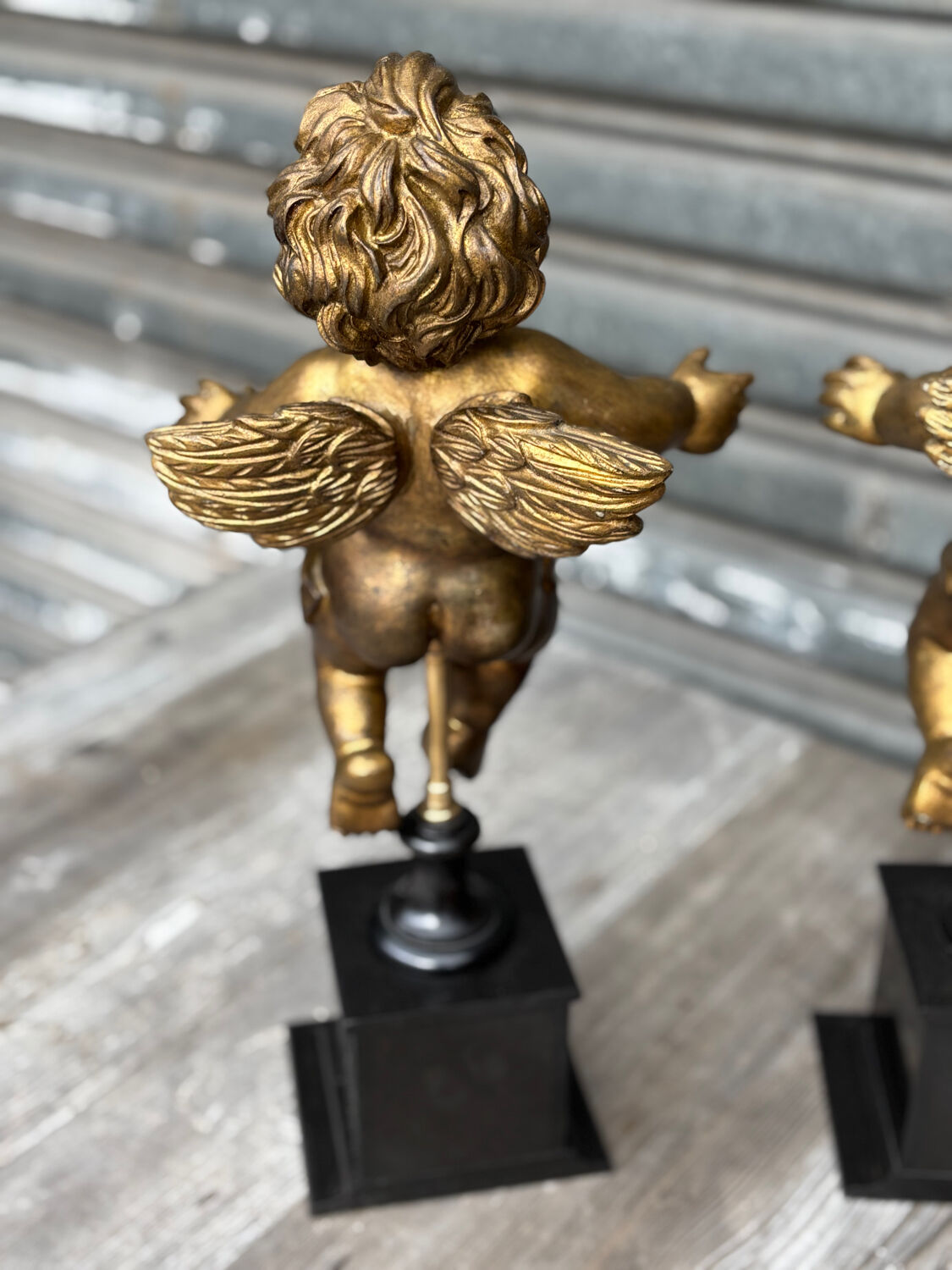 Pair of gilded cherubs on a Napoléon III base