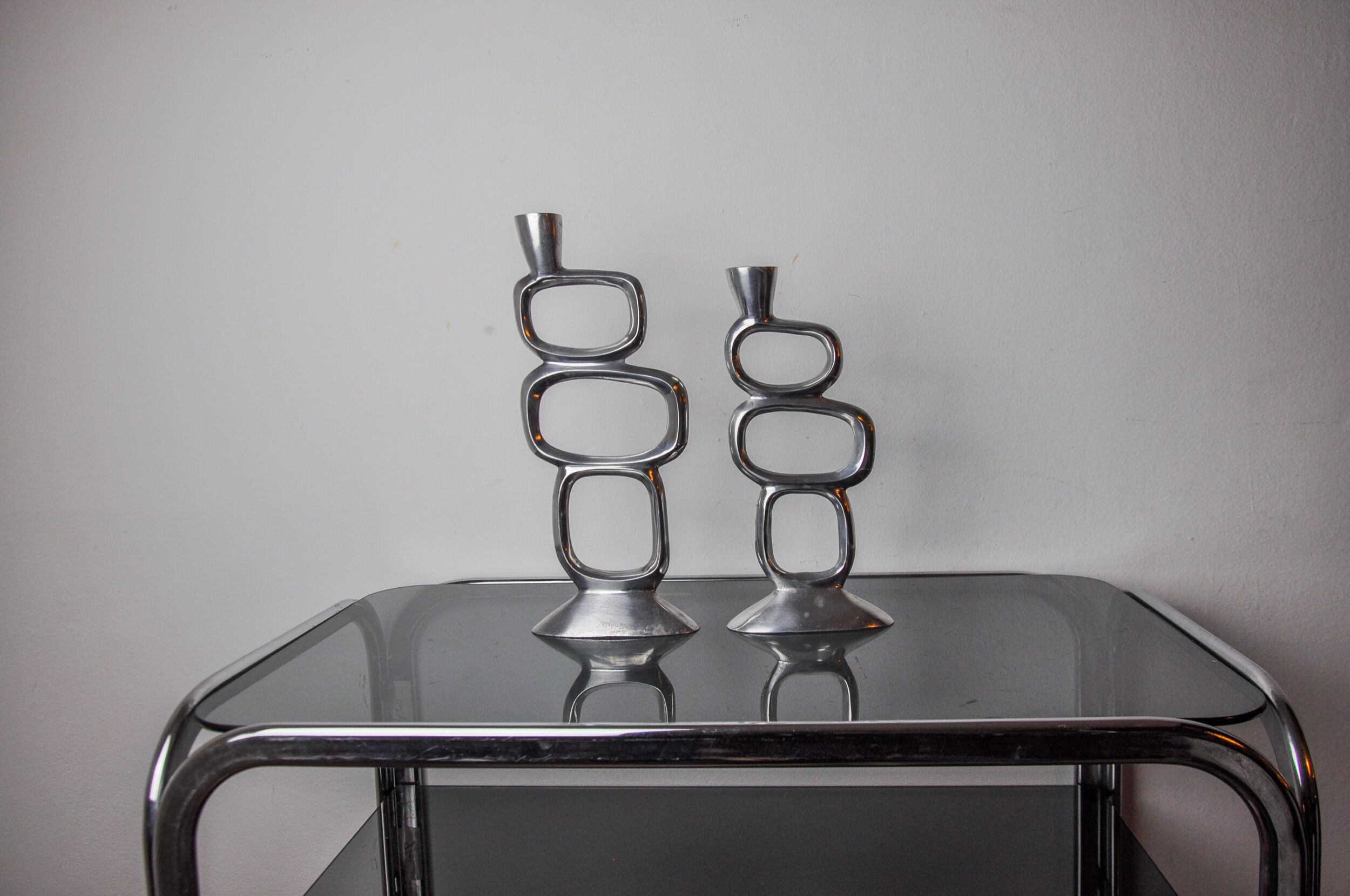 Pair of circle candlesticks by Matthew Hilton, England, 1980