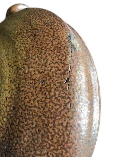 Old stoneware flask known as a toad from the 19th century.