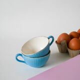Pair of digoin sarreguemines cups textured sky blue and gold edging 1950