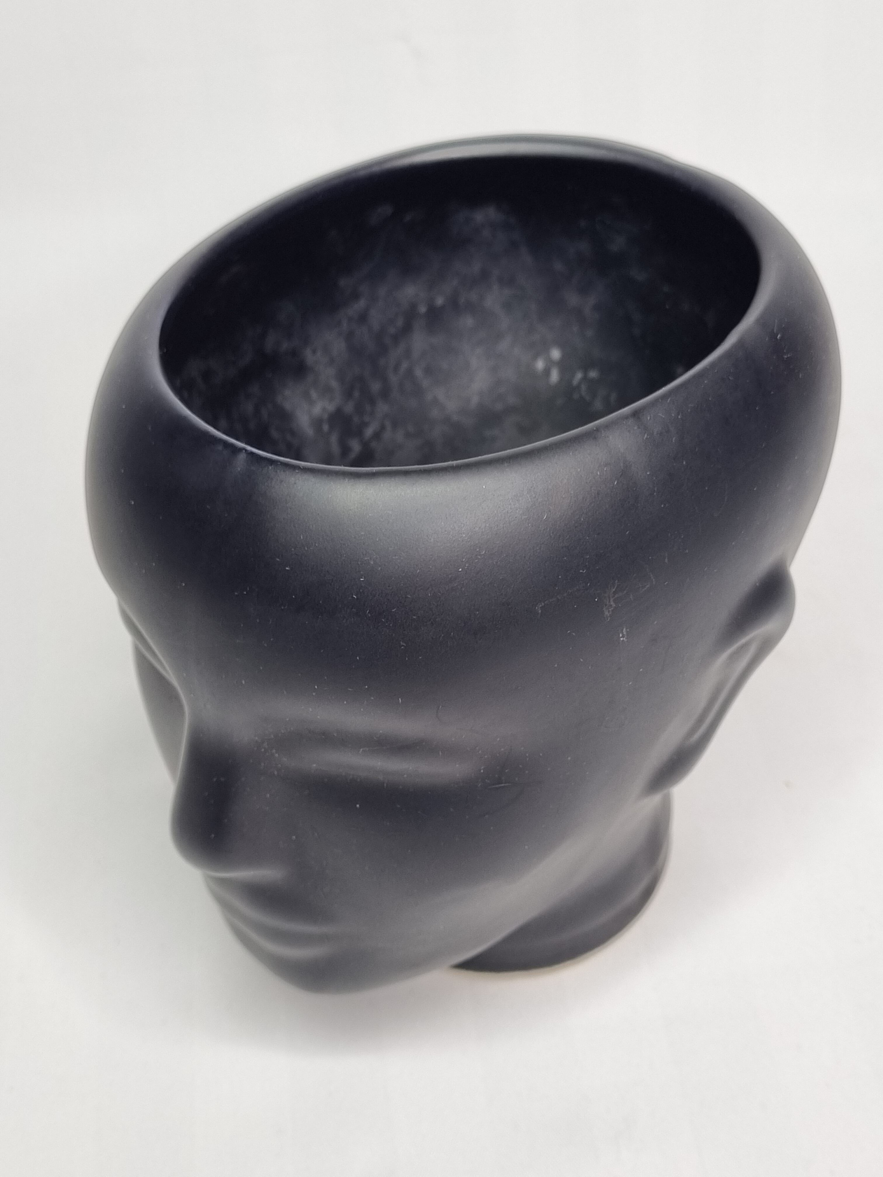 Anthropomorphic pot cover in matt black glazed ceramic, 80s