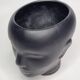Anthropomorphic pot cover in matt black glazed ceramic, 80s