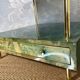 Aldo Tura side table in aqua green with brass legs and lower drawer.