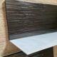 Pair of contemporary shelves in steel and stained wood