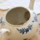 Antique teapot Saint-Uze steel clay with cobalt blue floral decoration.