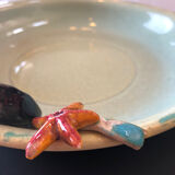 Paris ceramic dish with slip decoration, by Suzy Coste