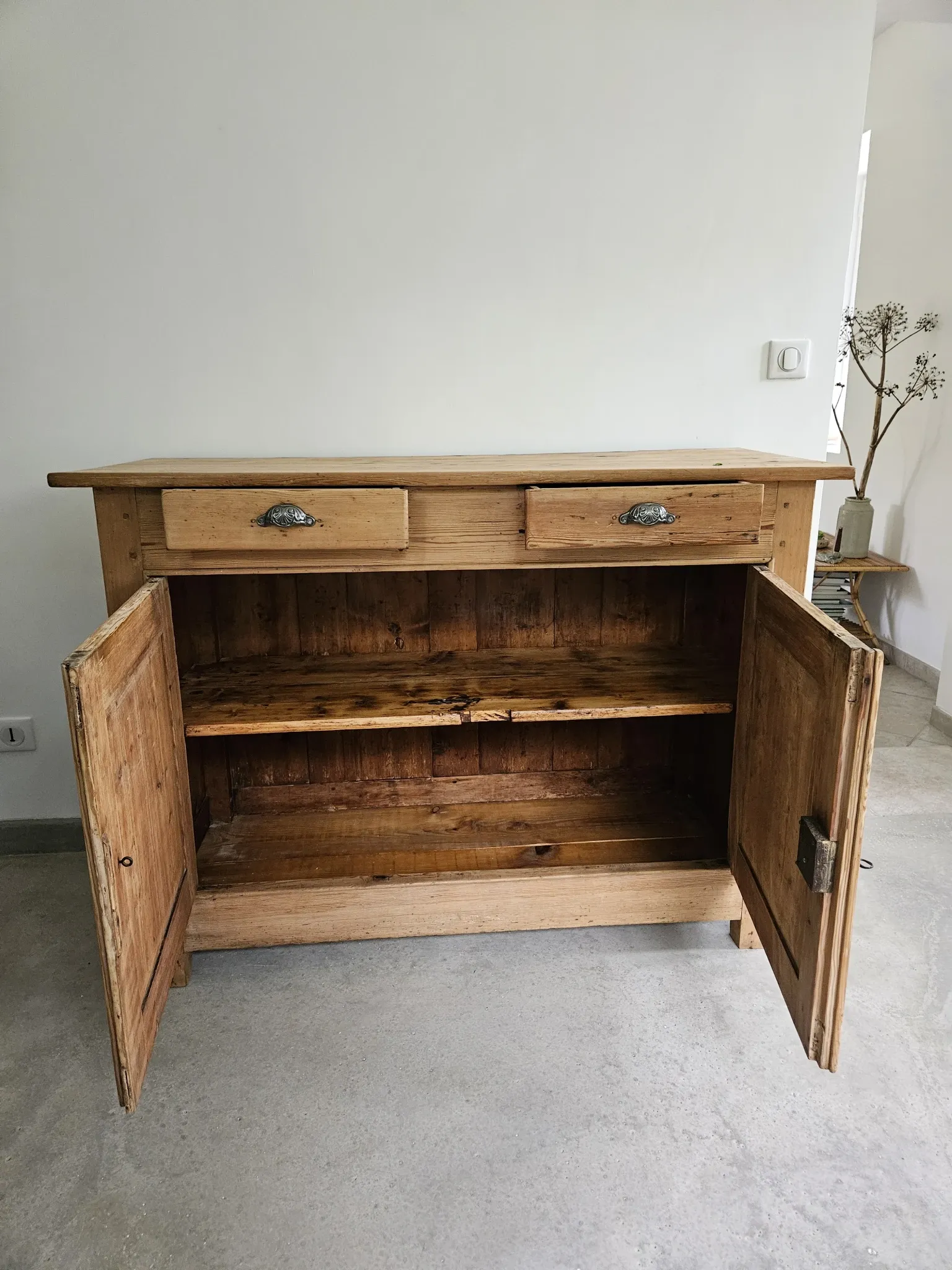 Very buffet just old solid raw pine wood.