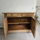 Very buffet just old solid raw pine wood.