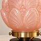 Penelope — Art Deco table lamp in sculpted pink glass, black brass base.