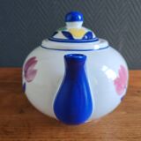 Antique teapot with flower pattern