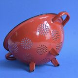 Vintage red enameled sheet metal colander