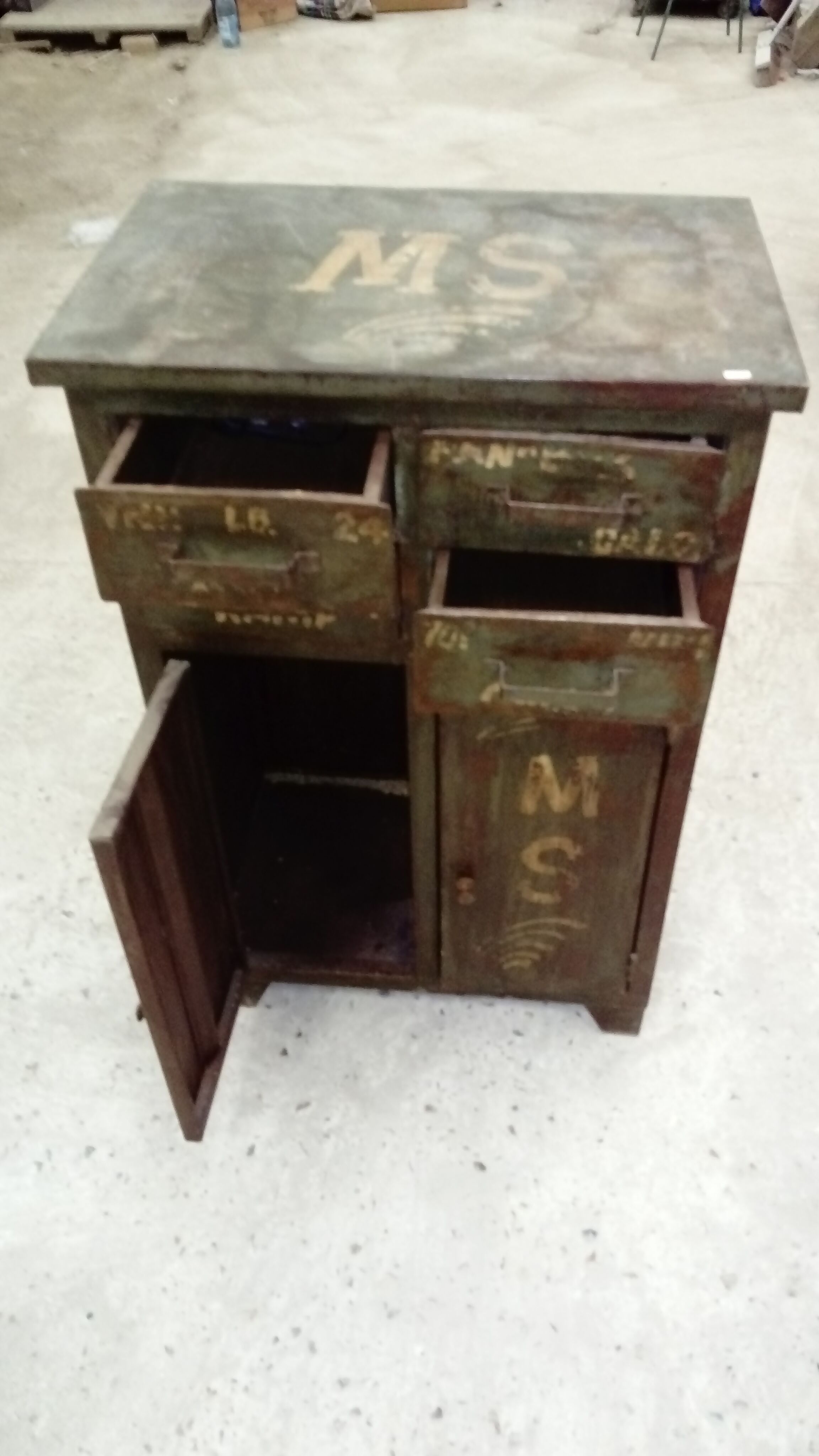 Patinated metal workshop furniture.