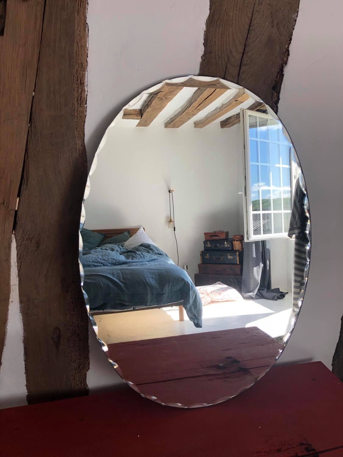 Old chissed oval mirror