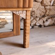 Art Deco glass-fronted sideboard in carved walnut and brass.