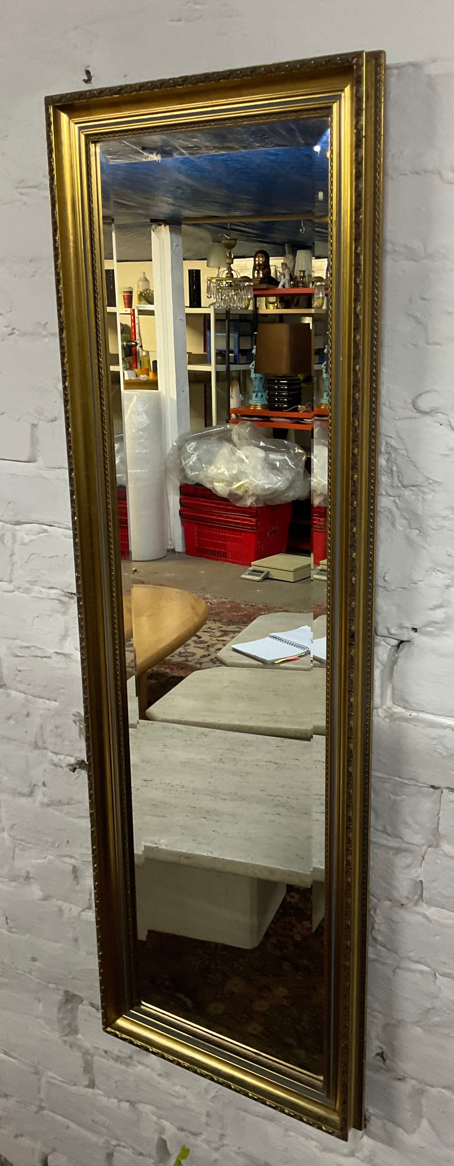 Vintage mirror in gilded wood and beveled glass