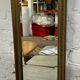 Vintage mirror in gilded wood and beveled glass