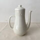 Coffee pot / teapot Sarreguemines France in white earthenware.
