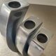 Trio of cast aluminum candle holders
