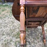 Louis Philippe oval shuttered table in solid cherry wood with 2 drawers.