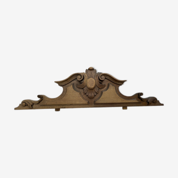 Carved wooden pediment