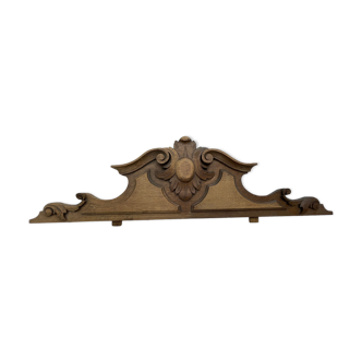 Carved wooden pediment