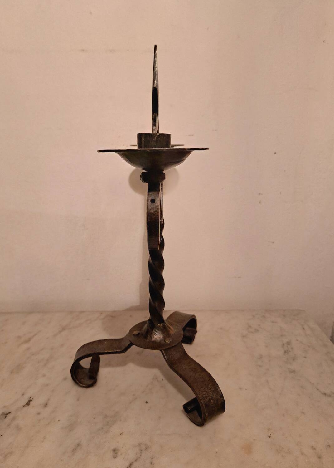 Black wrought iron fleur-de-lis candlestick