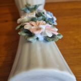 Porcelain vase with flowers in relief
