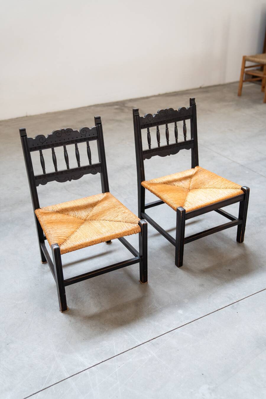 2 low bedroom chairs in hand-woven rice straw, 1950s/1960s