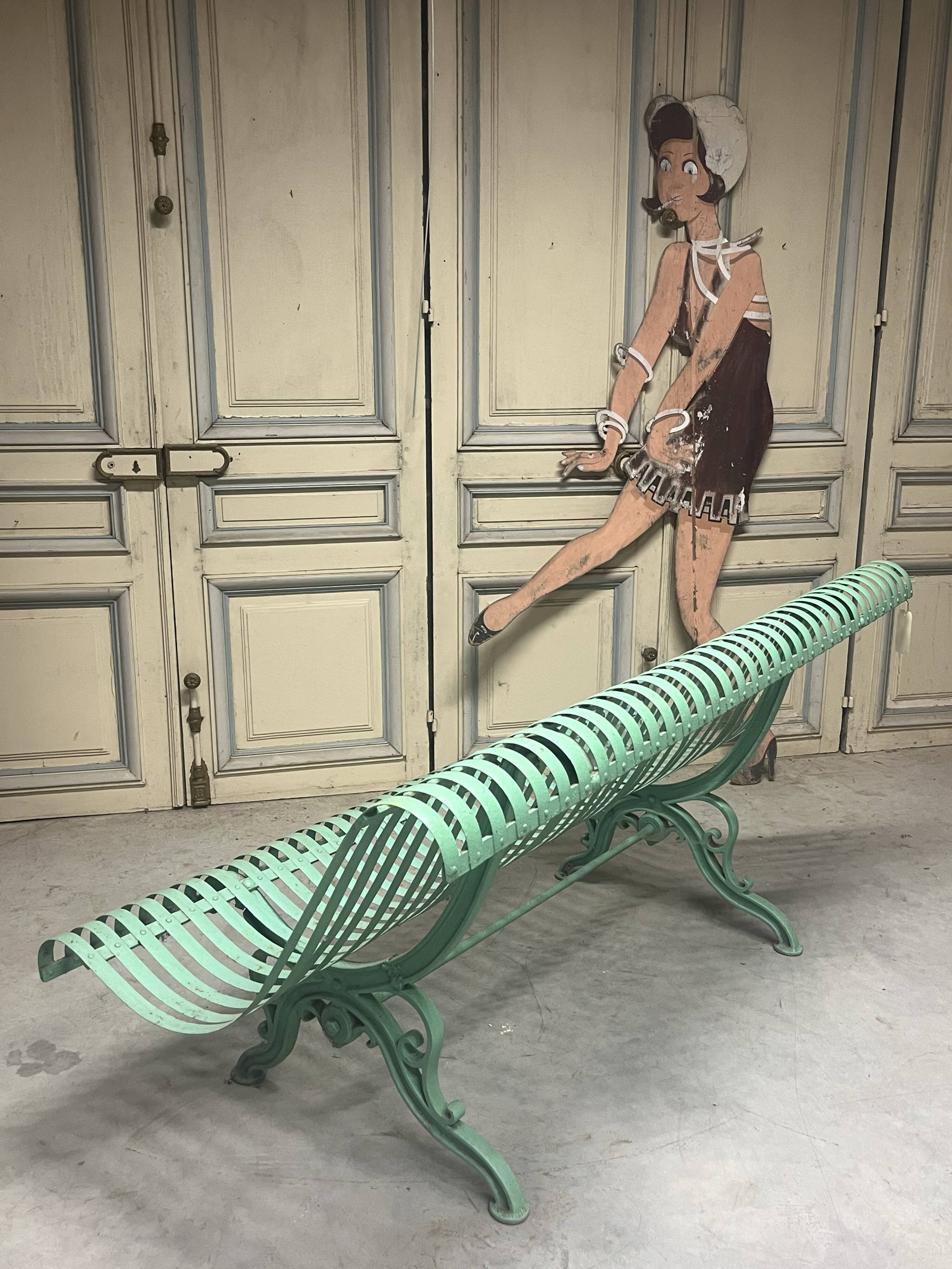 Wrought iron and cast iron garden bench from the late 19th century
