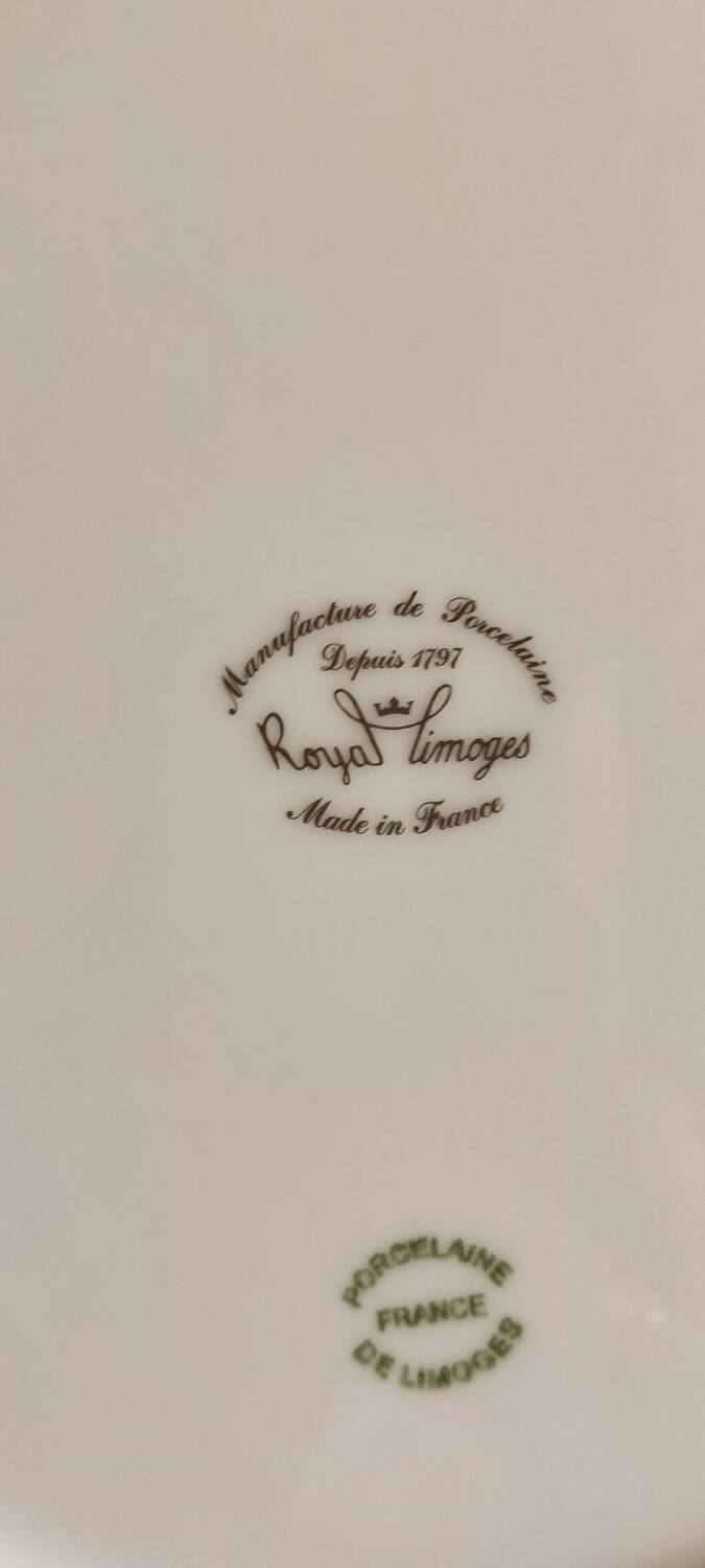 Set of porcelain plates with a frieze from Royal Limoges.