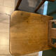 Pair of vintage wooden chairs in alpine chalet style.