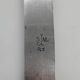 Set of 4 dessert knives with rounded blades and smooth ivory resin handles.