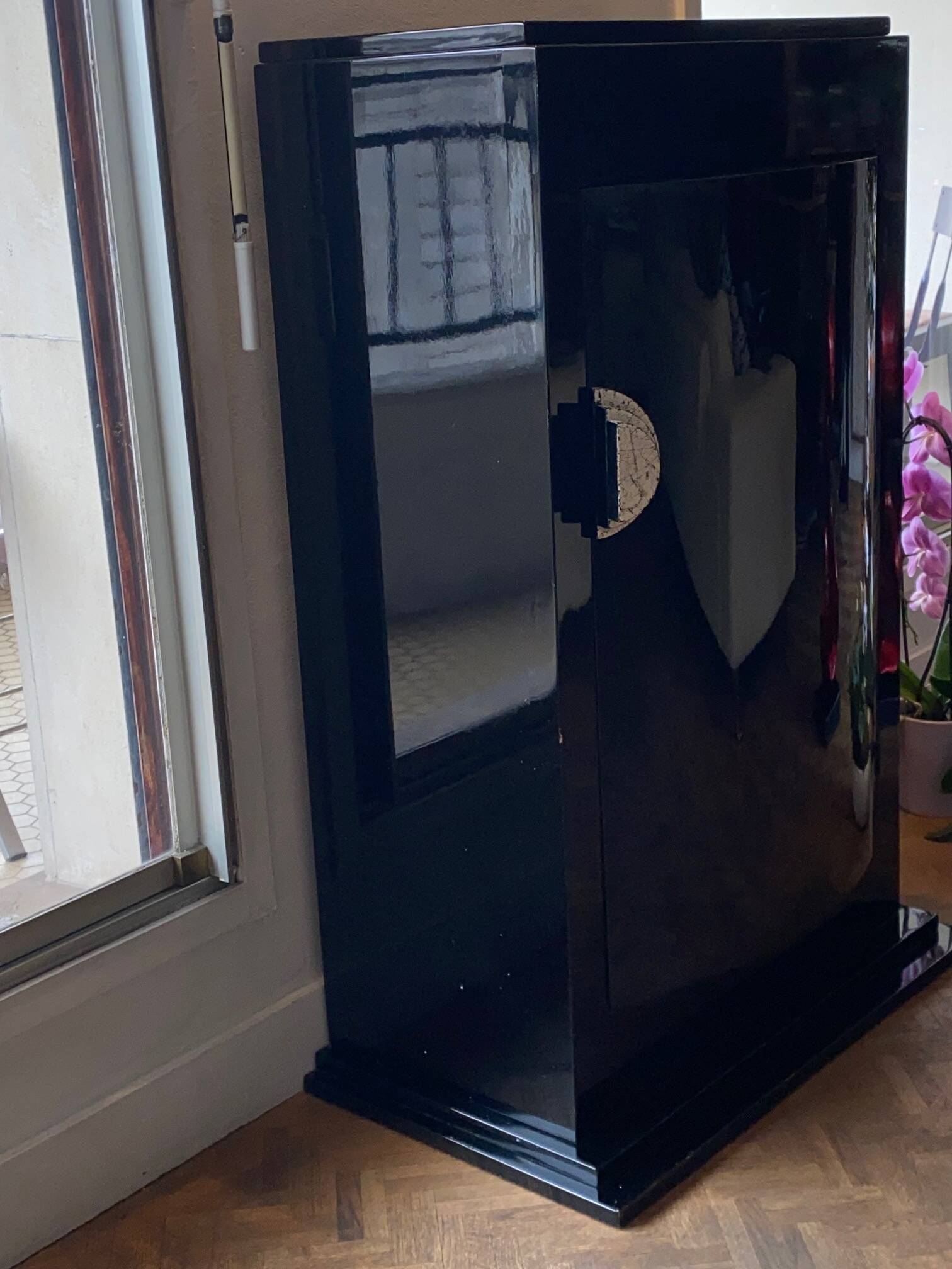 Curved black lacquered furniture signed assouline and dated 1987.