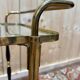 Glass, brass, and wood side table from the 1950s/60s.