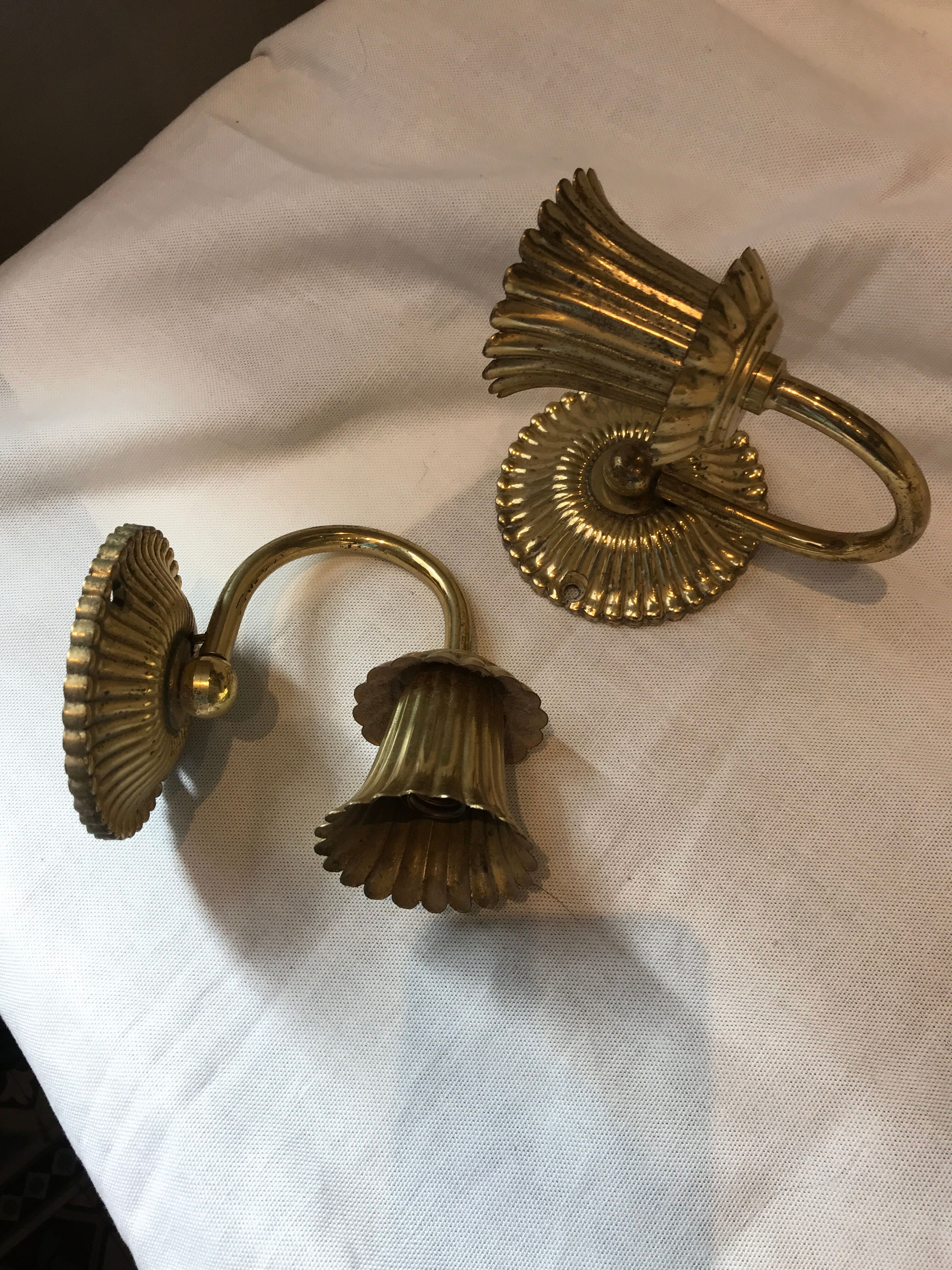 Pair of golden wall light