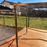 Brass side table with smoked glass.
