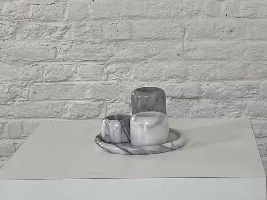 Set of marble candle holders with base