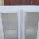 50s kitchen cabinet transformed with a patina makeover