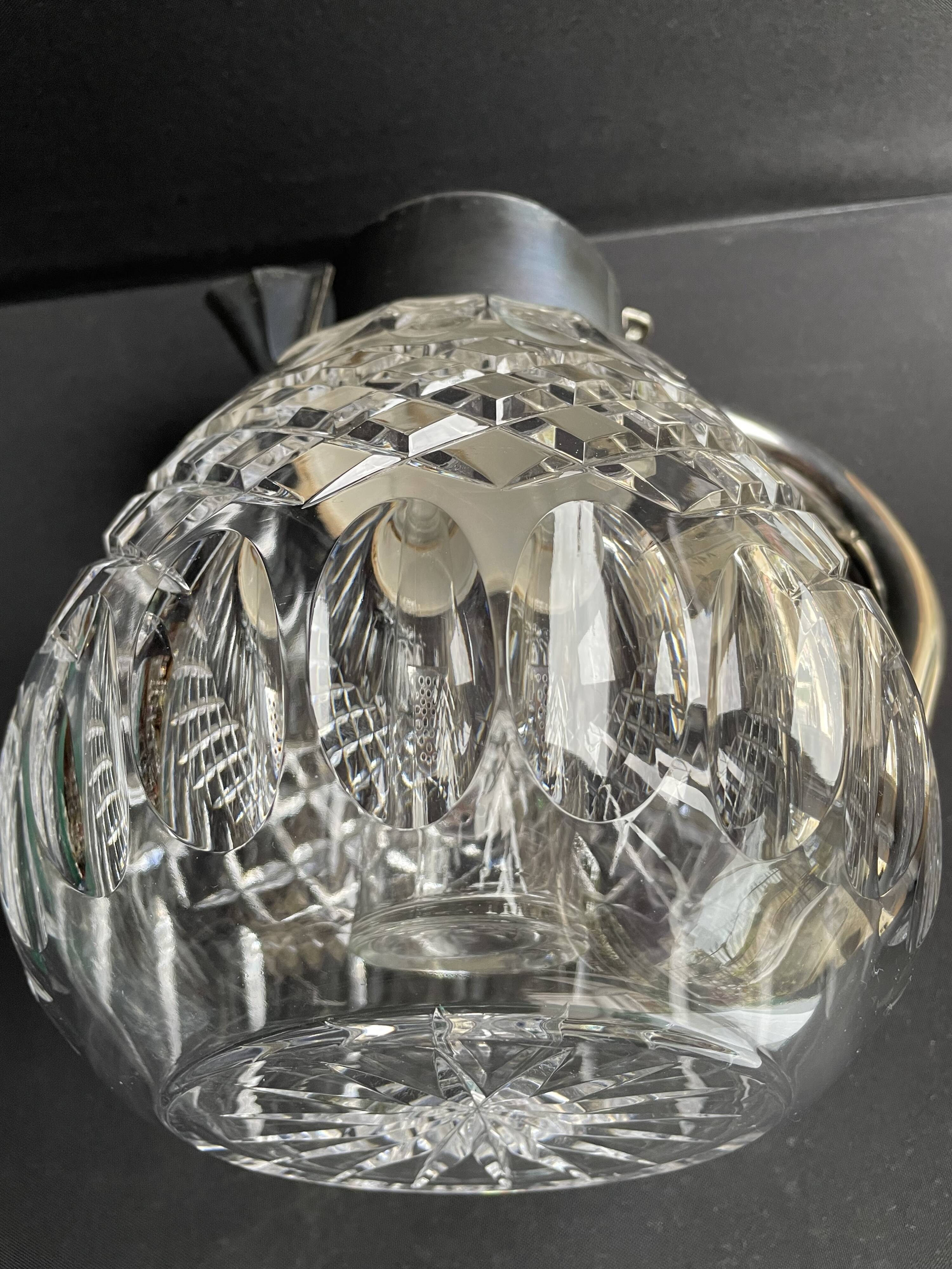 Important jug with ice reserve in cut crystal and silver-plated metal